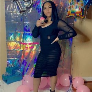 Fashion nova black and sheer long sleeve dress.
